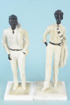 A pair of Art Deco style male and female figures, one marked F Navas,