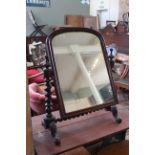 A Victorian mahogany dressing mirror on barley twist supports