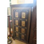 An Indian hardwood two door cupboard,