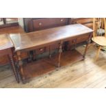 An oak and beech serving table with lower shelf and William and Mary style turned legs