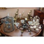 A pair of brass six branch candelabra with a pair of painted five branch candelabra with glass