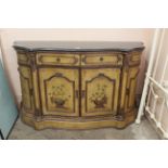 A 20th Century serpentine shaped credenza in the Italian style with hand painted floral panels and