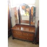 A 1930's oak dressing table with triple mirror