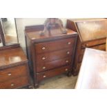 A 1930's oak four drawer chest with original Deco handles