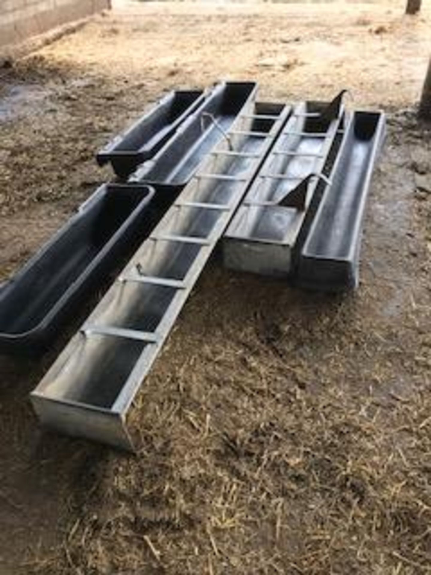 Plastic and metal feed troughs