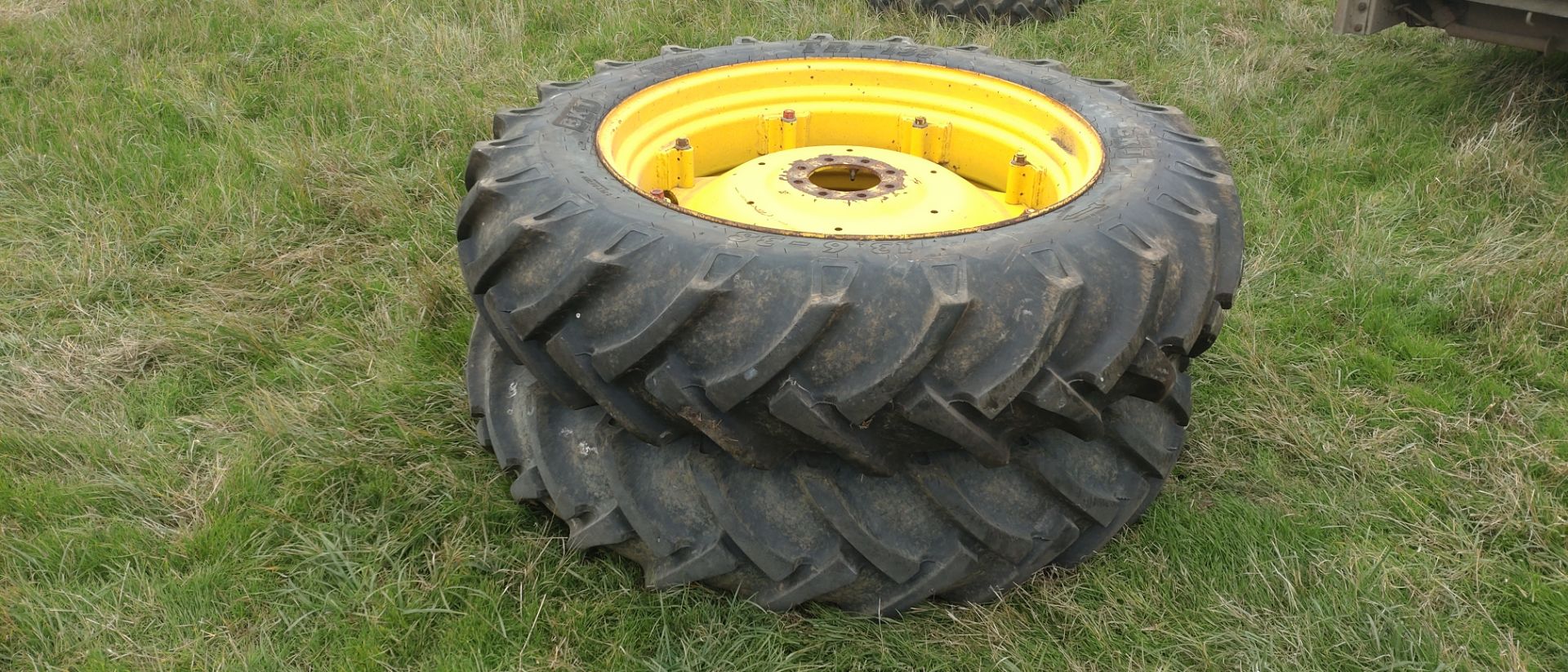 Pair of rear tractor wheels, complete with tyres, as used on J.D 6220/M.F. 6445, BKT 13.