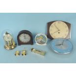 A selection of clocks including Metamec electric, clock under dome, two Smiths, one 'Seltric',