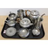 A quantity of pewter including a tea set,