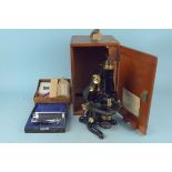 A cased vintage W Watson & Sons Ltd London 'Service' microscope 65619 with paperwork from 1938,