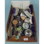 A small wooden tray with items of interest including a silver rim match striker/holder (glass as