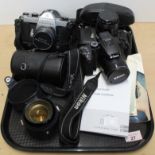 A Pentax Asahi 'Spotmatic F' camera, a Pentax Asahi, a Nikon Coolpix P500 camera,