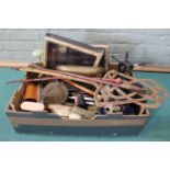A mixed box of items including a set of scales, small display boxes, riding crops,