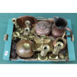 A mixed box of copper and brass including a seamed jug, candlesticks,