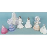 Seven Coalport figurines comprising four small size 'Wintertime', 'Springtime',