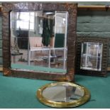 A vintage hand beaten copper framed mirror,