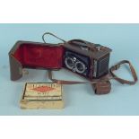 A cased vintage micro Precision Products 'Microcord' camera plus a small box of Ilford camera