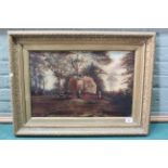 A late 19th Century framed oil on canvas of a loaded hay wain with figures in a landscape,