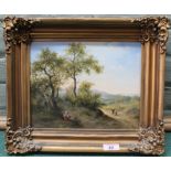 A mid 19th Century British school framed oil on canvas of a wooded landscape with figures and hills