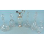 Four antique decanters with stoppers,