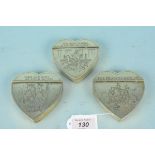 A set of three heart shaped brass snuff boxes viz: first one engraved with a sailing ship and