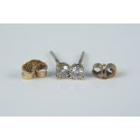 A pair of 9ct gold diamond set stud earrings