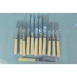 Six silver bladed dessert knives and forks (one non matching)