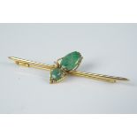 An Oriental yellow metal long form brooch set with jade, stamped 14K, weight approx 2.
