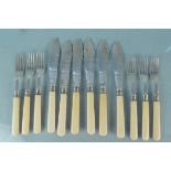 A set of six silver bladed fish knives and forks, hallmarked Sheffield 1905,