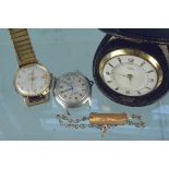 A gold plated Smiths and a military style wristwatch together with a Smiths Empire desk travelling
