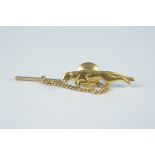A 9ct gold jaguar form tie pin,
