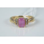 A 10ct gold pink stone and diamond set ring,