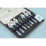 A cased set of six silver teaspoons and sugar tongs, hallmarked Sheffield 1946,