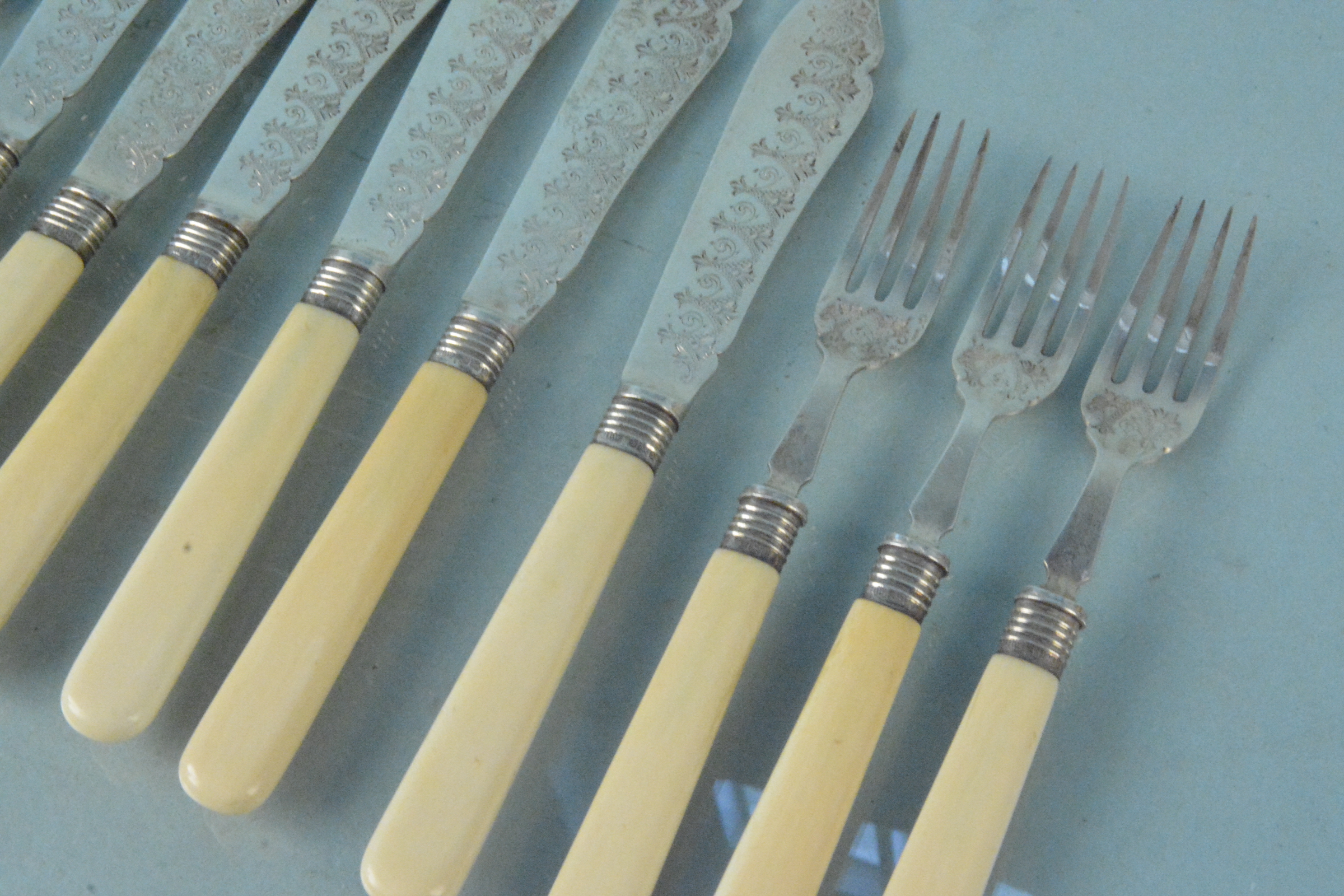 A set of six silver bladed fish knives and forks, hallmarked Sheffield 1905, - Image 3 of 3