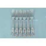 A set of six Victorian silver shell pattern forks, hallmarked London 1844,