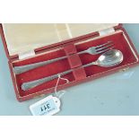 A cased silver pickle fork and spoon, hallmarked Sheffield 1967,