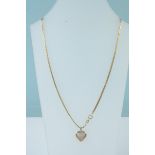 A 9ct gold diamond encrusted heart pendant on 9ct gold chain,