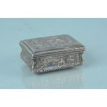 An antique embossed continental silver table snuff box with gilt interior and people dancing