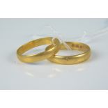 Two 22ct gold wedding bands, weight approx 10.