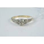 An antique 18ct platinum set solitaire diamond ring,