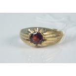 A gents 9ct gold garnet set ring, size Q, weight approx 4.
