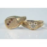 Two 9ct gold stone set gents rings,