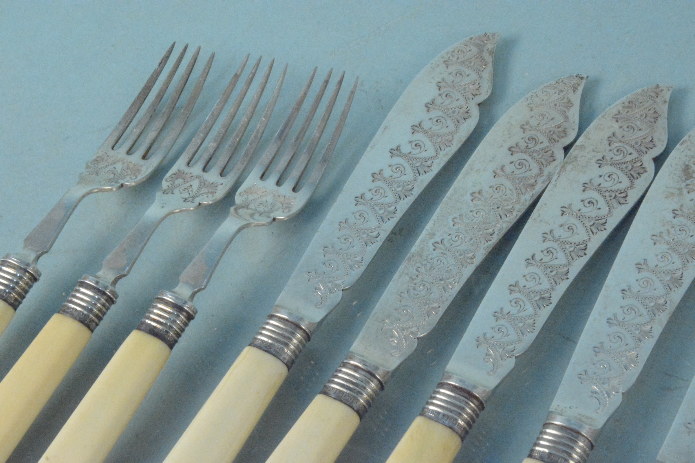 A set of six silver bladed fish knives and forks, hallmarked Sheffield 1905, - Image 2 of 3