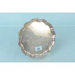 A silver salver with presentation inscription, hallmarked Birmingham 1946,