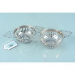 A pair of William Comyns silver pierced twin handled bon bon dishes, hallmarked London 1896,