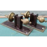 A large pair of brass and copper effect electrified wall lights,