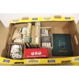 A selection of tea and cigarette cards, mostly loose, three empty cigar boxes,