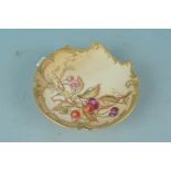 A Royal Worcester hand painted and gilded fruit plate, pattern 1426,