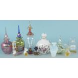 A selection of ceramic and glass perfume bottles