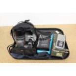 A Lumix Panasonic DMC-FZ30 camera with lens and carry bag,