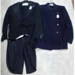 A vintage mans black evening dress suit comprising of a jacket, trousers and waistcoat, small size,